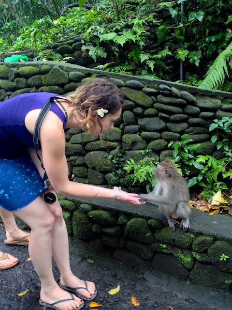 Carrie holding a monkey's hand